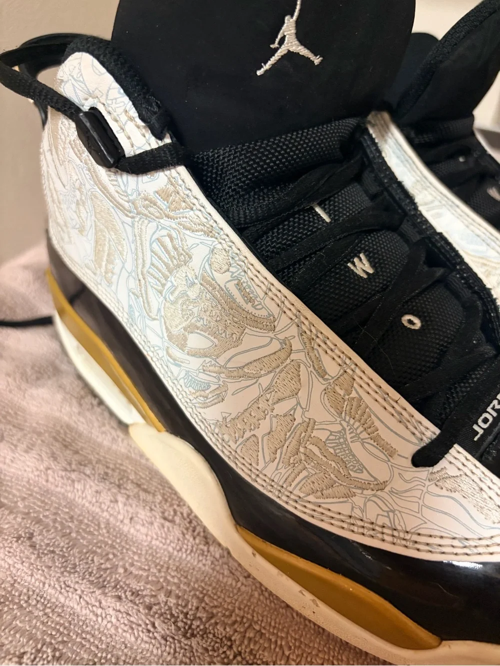 Jordan Mid-Top Sneakers in Black, White & Gold Detailing